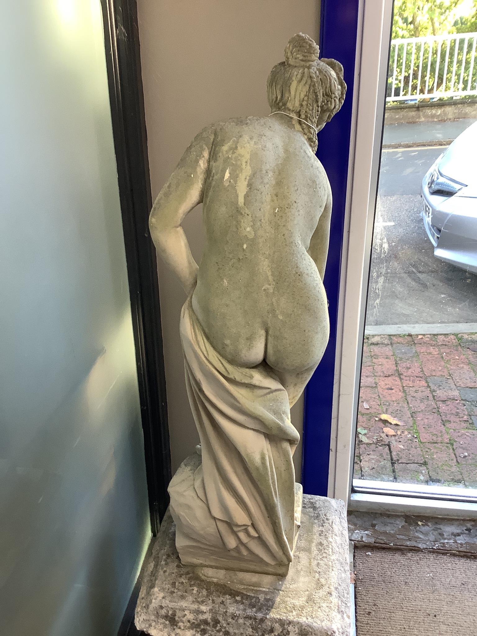 A 19th century carved marble statue of Venus, raised on a reconstituted plinth, height 135cm